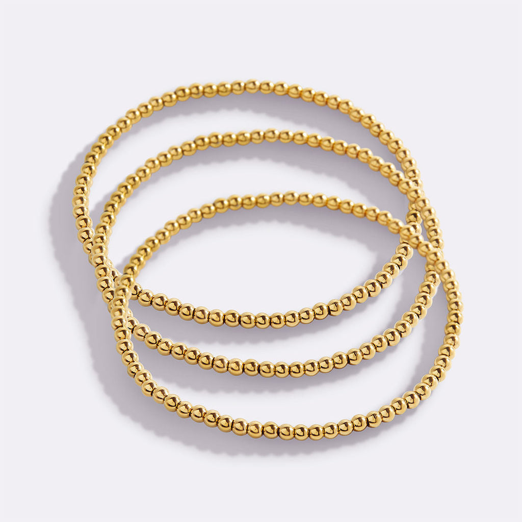 Mint & Lily Ensemble de Bracelets à Perles Dorées Superposables 3 mm
